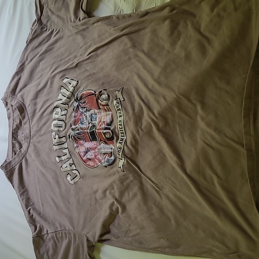 This is a tan colored, Shein shirt, size small, with California logo.